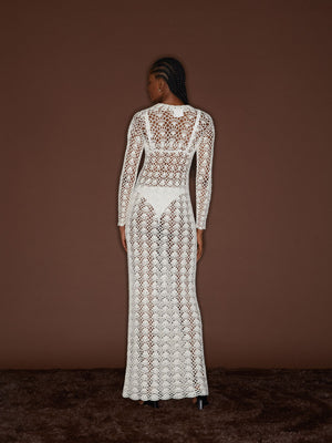 Back view of a female figure wearing the White 09 Crochet Dress