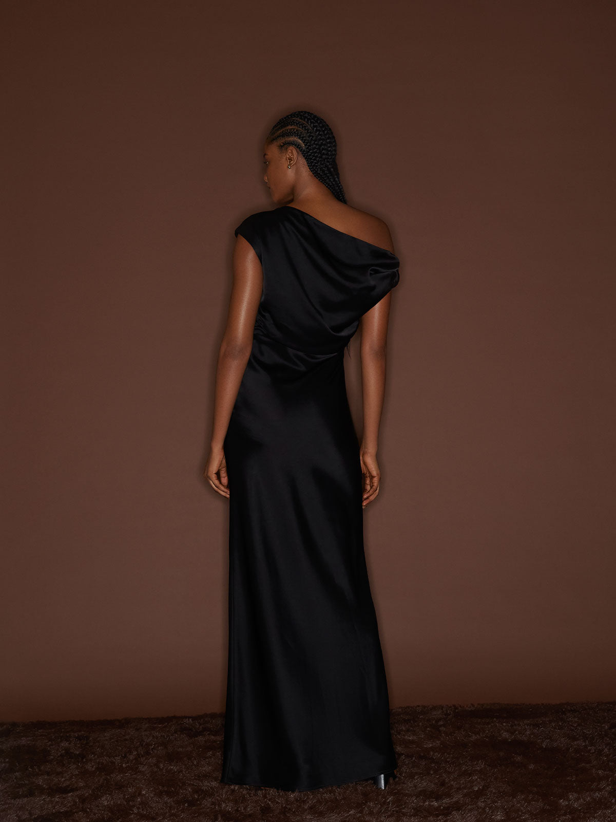 Back view of a female figure wearing the Black 09 Davie Dress