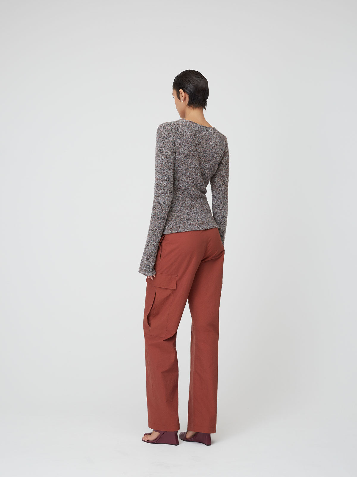 Back view of a female figure wearing the Mixed Berry 09 Knubby Fitted Jumper