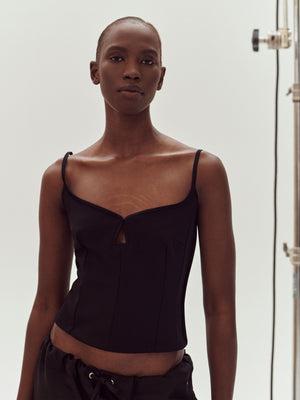 A model wearing Black Marlo Singlet