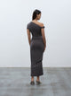 Rear view of a model wearing the 05 Elemental Ida Dress Mushroom