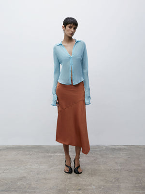 Woman facing forwards wearing the Iris Blue 09 Sheer Silk Shirt 