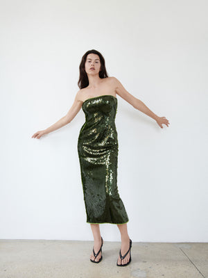 A female figure with her arms outstretched sideways wearing the Cactus 09 Audrey Dress