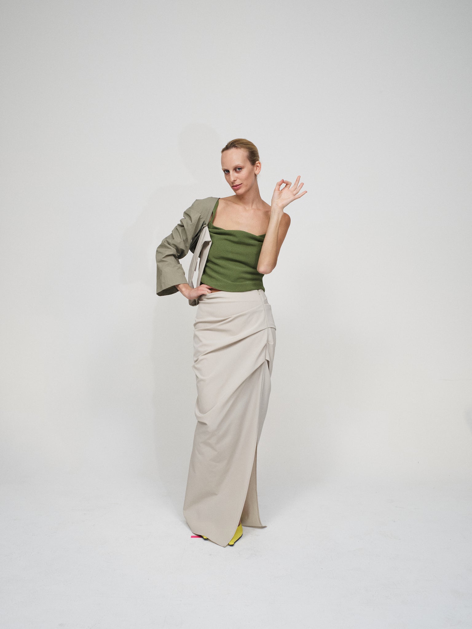 Model with hand on hip wearing Remmy Skirt in Fawn